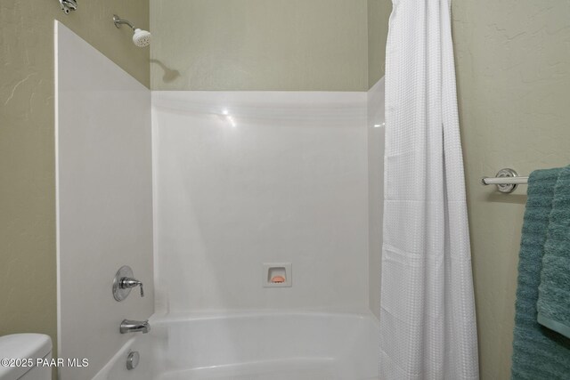 1109 N Half Hitch Rd, Prescott Valley, AZ 86314 - bathroom featuring shower / bath combo with shower curtain and toilet