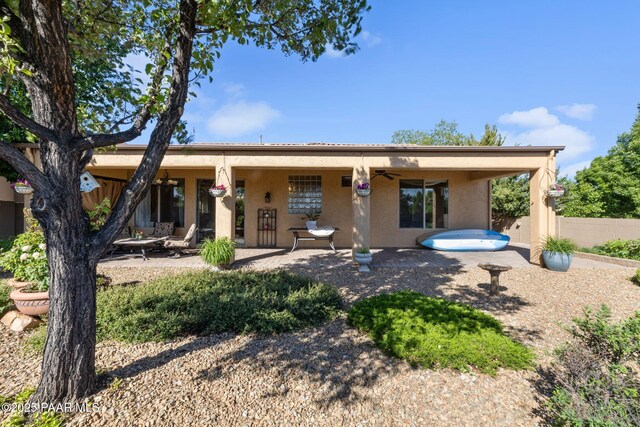 1109 N Half Hitch Rd, Prescott Valley, AZ 86314 - rear view of house featuring stucco siding, ceiling fan, and a patio area