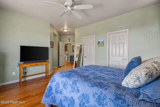 1109 N Half Hitch Rd, Prescott Valley, AZ 86314 - bedroom with wood finished floors, baseboards, and ceiling fan