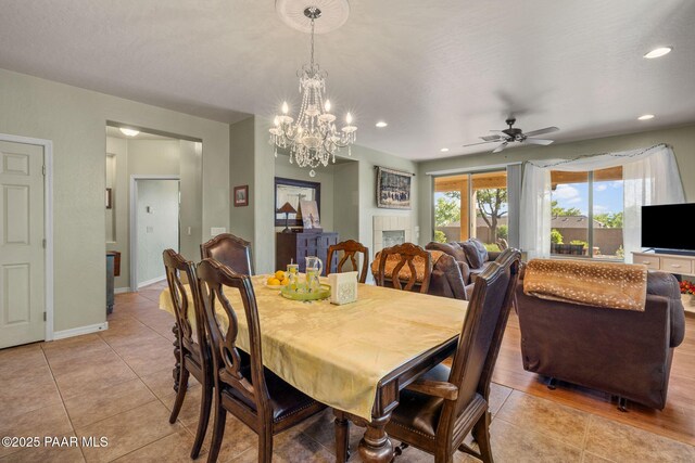 1109 N Half Hitch Rd, Prescott Valley, AZ 86314 - dining area featuring light tile patterned floors, recessed lighting, ceiling fan, a chandelier, and baseboards