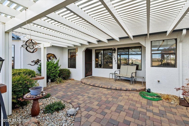 view of patio / terrace featuring a pergola