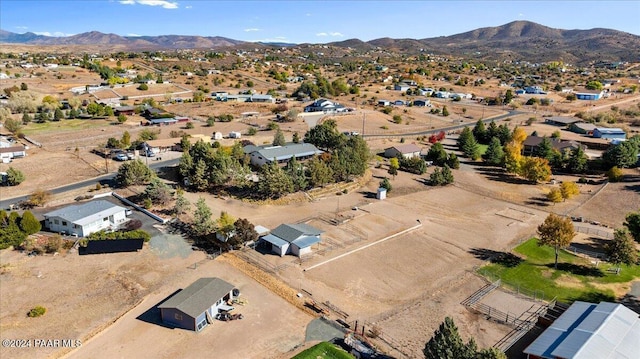 drone / aerial view featuring a mountain view