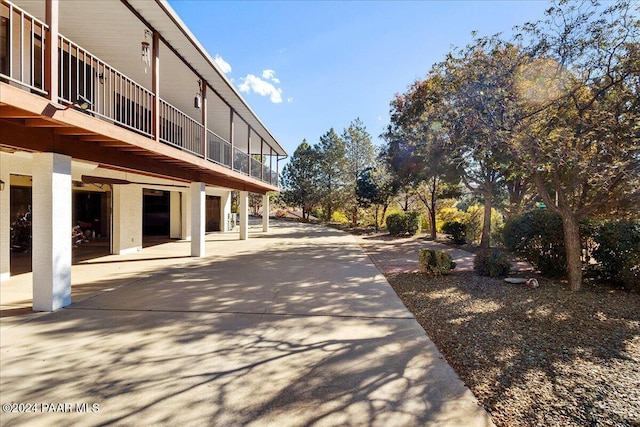 view of property's community featuring a patio area