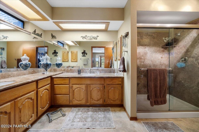 bathroom with vanity and an enclosed shower