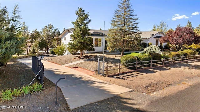 view of property hidden behind natural elements