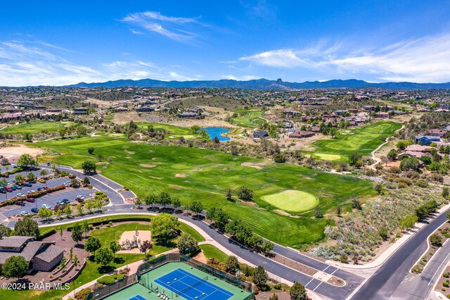 birds eye view of property with a mountain view