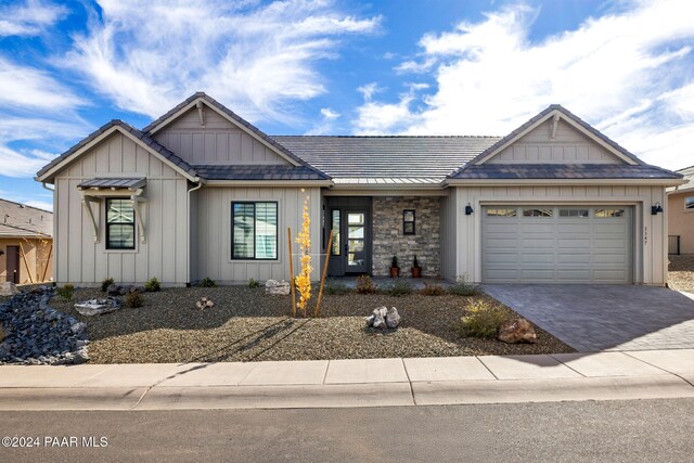 view of front of home with a garage