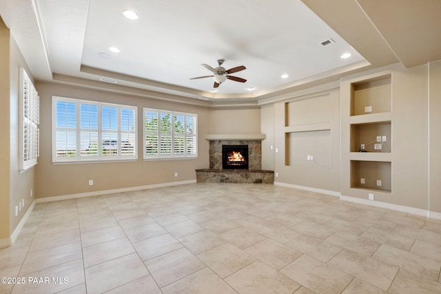 3280 Stone Cliff Ct, Prescott, AZ 86301 - unfurnished living room with a raised ceiling, a ceiling fan, built in features, baseboards, and recessed lighting