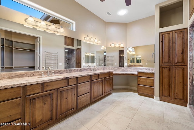 3280 Stone Cliff Ct, Prescott, AZ 86301 - full bath with a ceiling fan, double vanity, tile patterned flooring, and a towel warmer