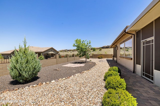 3280 Stone Cliff Ct, Prescott, AZ 86301 - fenced backyard with a patio area