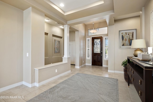 3280 Stone Cliff Ct, Prescott, AZ 86301 - entryway featuring ornate columns, light tile patterned floors, baseboards, and recessed lighting
