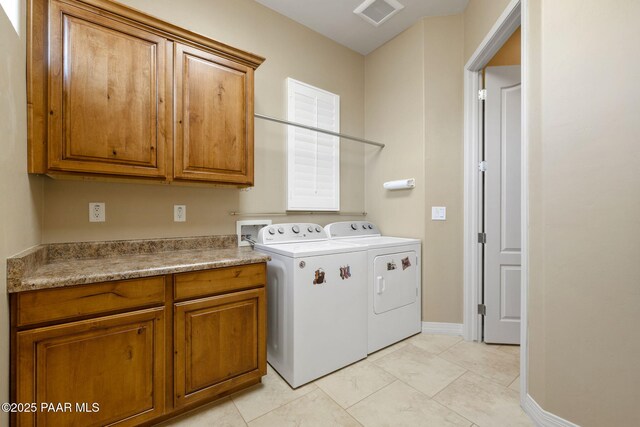 3280 Stone Cliff Ct, Prescott, AZ 86301 - laundry room with washing machine and dryer, cabinet space, light tile patterned floors, and baseboards