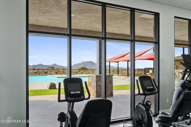 3280 Stone Cliff Ct, Prescott, AZ 86301 - workout area featuring a mountain view, plenty of natural light, and floor to ceiling windows