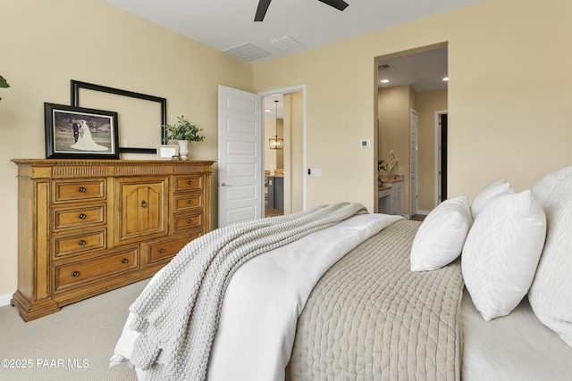 24757 N 175th Dr, Surprise, AZ 85387 - bedroom featuring light carpet, a ceiling fan, and ensuite bath