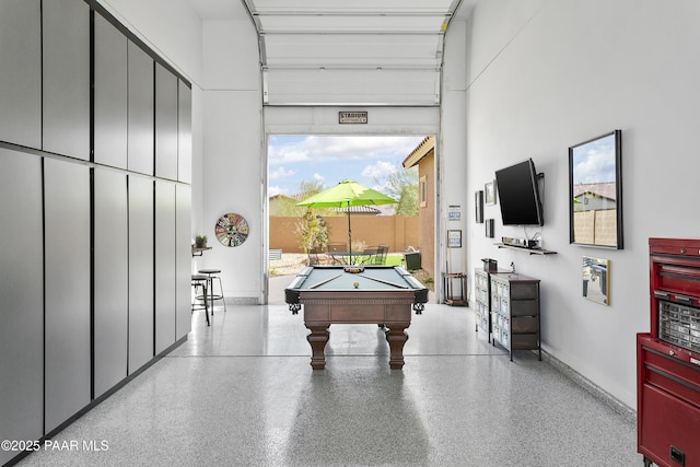24757 N 175th Dr, Surprise, AZ 85387 - playroom with pool table, a high ceiling, and speckle patterned floor