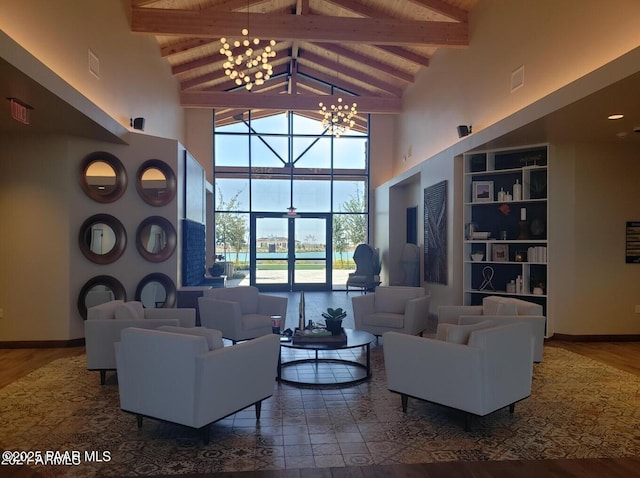 24757 N 175th Dr, Surprise, AZ 85387 - living room with high vaulted ceiling, a chandelier, a wooden ceiling with exposed beams, and built in shelves