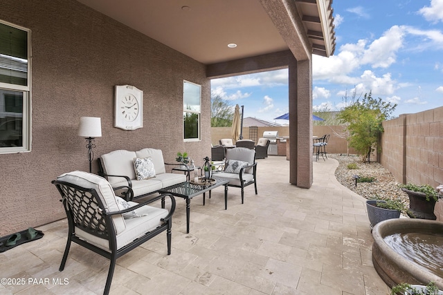 24757 N 175th Dr, Surprise, AZ 85387 - fenced backyard with outdoor lounge area, a patio, and grilling area