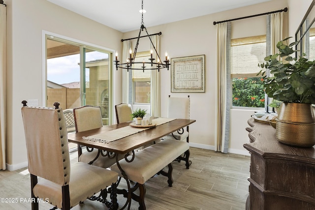 24757 N 175th Dr, Surprise, AZ 85387 - dining space with a chandelier and light wood-style flooring