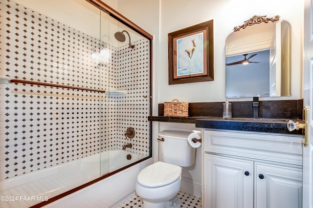 306 S Mt Vernon Ave, Prescott, AZ 86303 - bathroom featuring toilet, enclosed tub / shower combo, and vanity