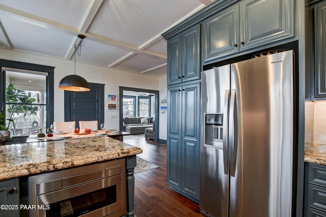 306 S Mt Vernon Ave, Prescott, AZ 86303 - kitchen featuring light stone countertops, decorative light fixtures, dark wood finished floors, open floor plan, and stainless steel appliances