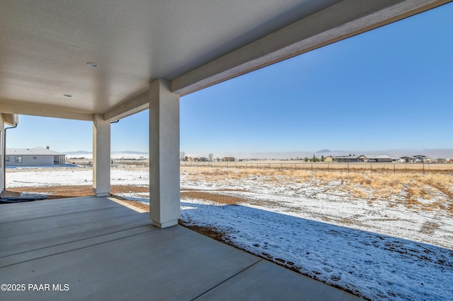 view of snow covered patio