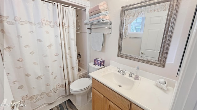 full bathroom featuring shower / bath combo with shower curtain, vanity, and toilet