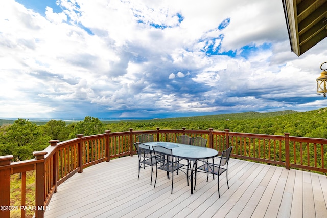 2667 N Overlook Dr, Williams, AZ 86046 - deck with outdoor dining space and a wooded view