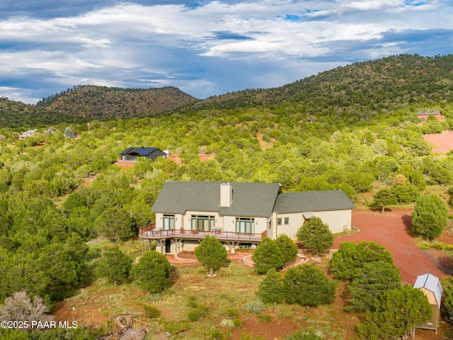 2667 N Overlook Dr, Williams, AZ 86046 - view from above of property with a heavily wooded area and a mountain backdrop
