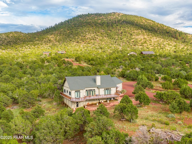 2667 N Overlook Dr, Williams, AZ 86046 - aerial view of property and surrounding area with a mountain backdrop and a heavily wooded area