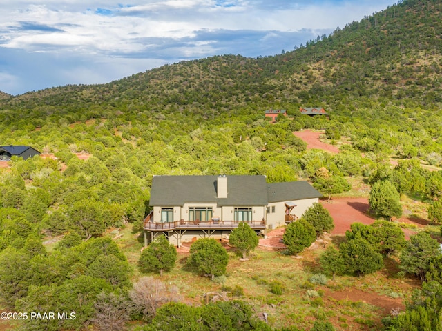 2667 N Overlook Dr, Williams, AZ 86046 - view of subject property with a heavily wooded area and a mountainous background