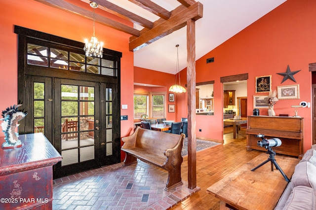 2667 N Overlook Dr, Williams, AZ 86046 - foyer entrance with a chandelier, beamed ceiling, and high vaulted ceiling