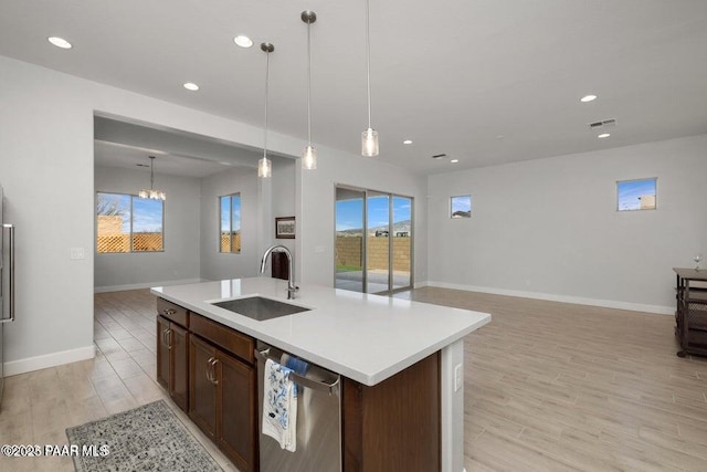 7942 E Carbon Ct Unit 20-A, Prescott Valley, AZ 86315 - kitchen featuring stainless steel dishwasher, open floor plan, light wood finished floors, light countertops, and recessed lighting
