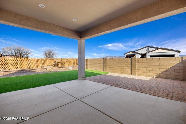 7942 E Carbon Ct Unit 20-A, Prescott Valley, AZ 86315 - fenced backyard featuring a patio