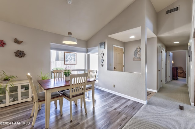 1665 Quail Run, Prescott, AZ 86303 - dining area featuring vaulted ceiling and dark hardwood / wood-style floors