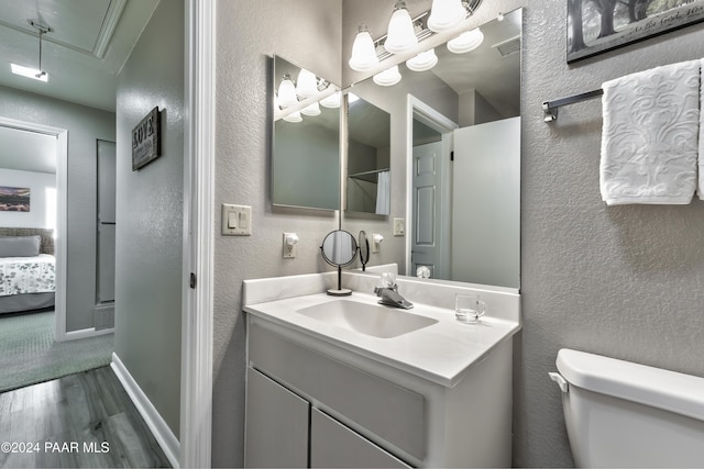 1665 Quail Run, Prescott, AZ 86303 - bathroom featuring vanity, hardwood / wood-style flooring, and toilet
