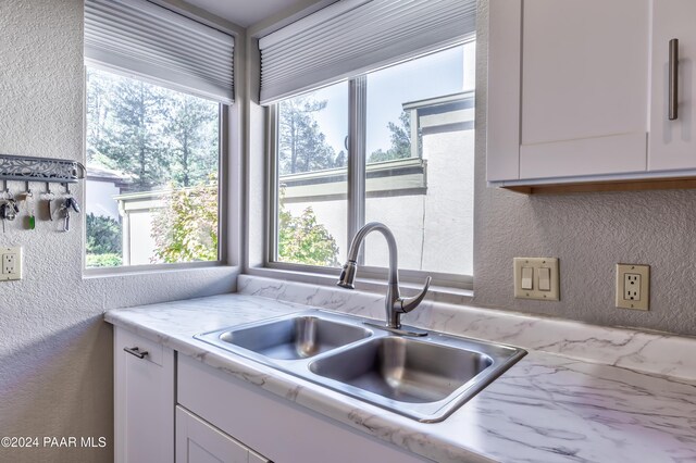 1665 Quail Run, Prescott, AZ 86303 - kitchen with white cabinetry and sink
