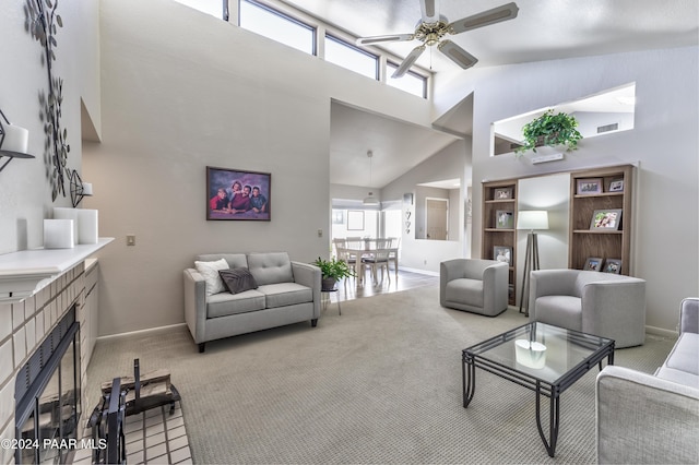 1665 Quail Run, Prescott, AZ 86303 - living room with a fireplace, a high ceiling, carpet floors, and ceiling fan