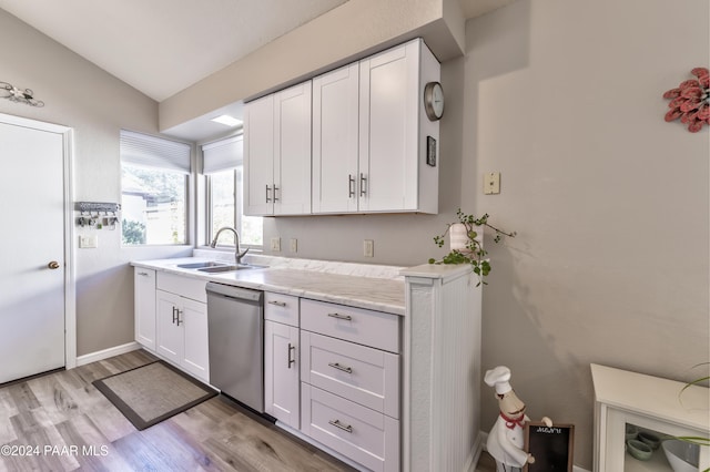 1665 Quail Run, Prescott, AZ 86303 - kitchen featuring dishwasher, white cabinets, light hardwood / wood-style flooring, and sink