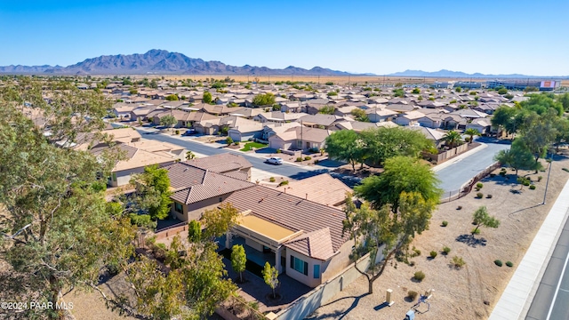 birds eye view of property with a mountain view