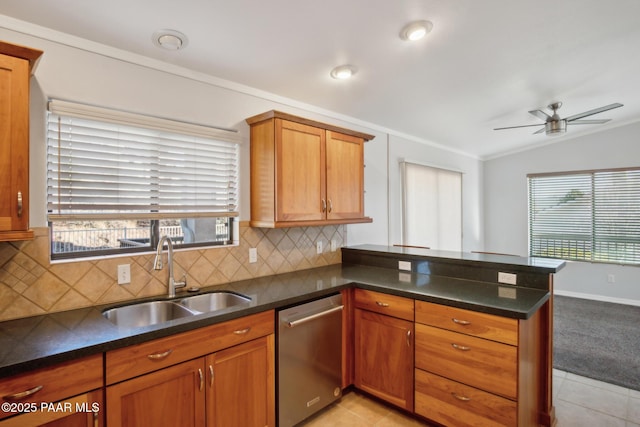 739 Yavapai Hills Dr, Prescott, AZ 86301 - kitchen with stainless steel dishwasher, a peninsula, a ceiling fan, vaulted ceiling, and tasteful backsplash