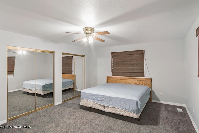 739 Yavapai Hills Dr, Prescott, AZ 86301 - bedroom with two closets, carpet floors, and a ceiling fan