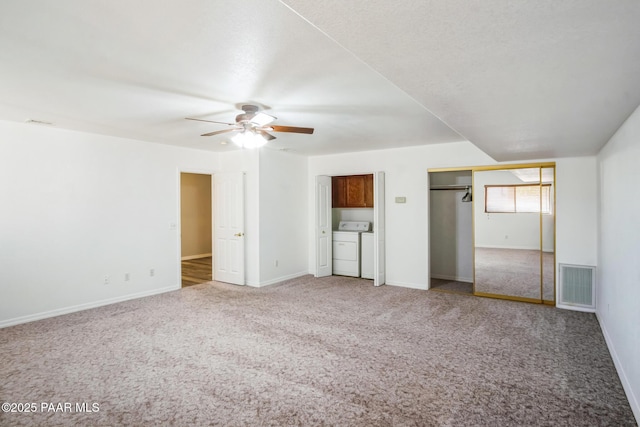 739 Yavapai Hills Dr, Prescott, AZ 86301 - unfurnished living room with ceiling fan, washer and dryer, and carpet floors