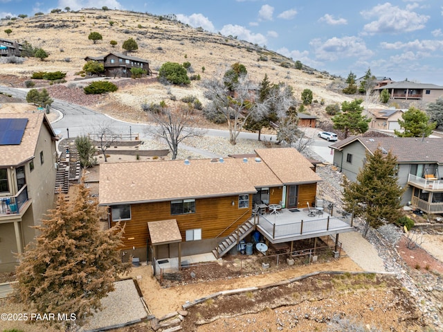 birds eye view of property with a residential view and a mountain view
