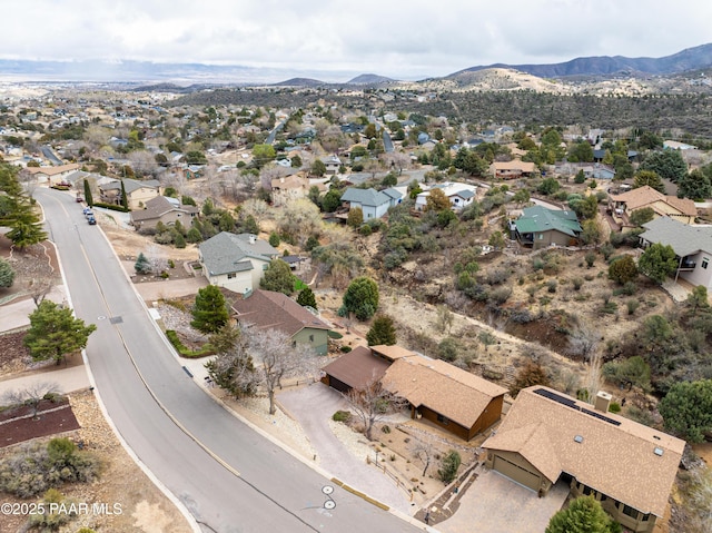birds eye view of property with a residential view and a mountain view