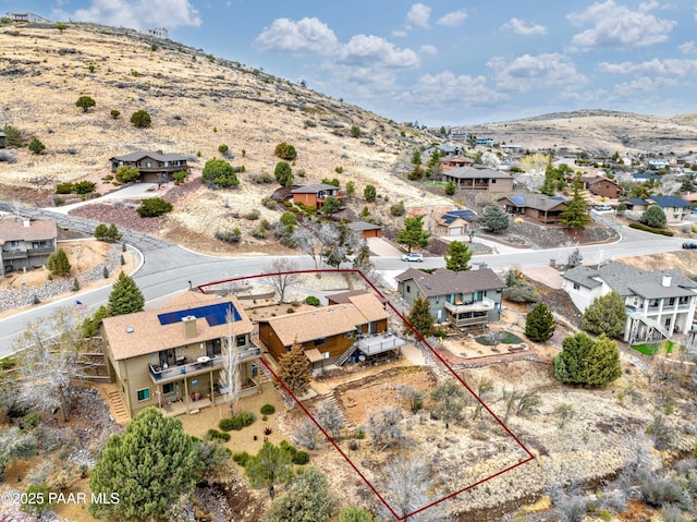 bird's eye view featuring a mountain view and a residential view