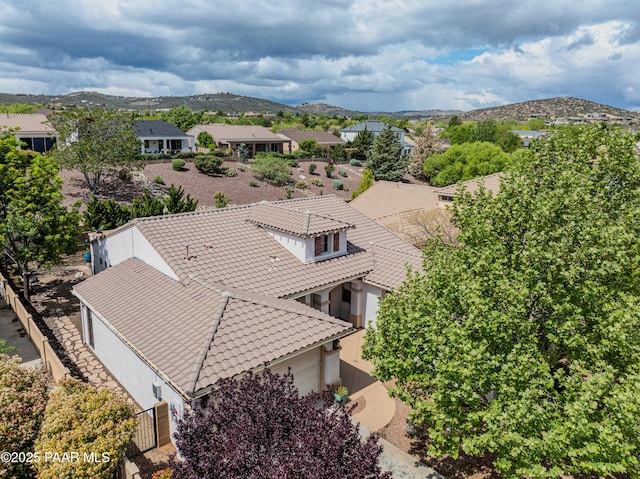 aerial perspective of suburban area with mountains
