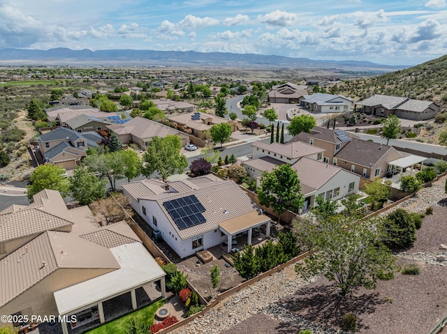 aerial view of residential area with a mountainous background