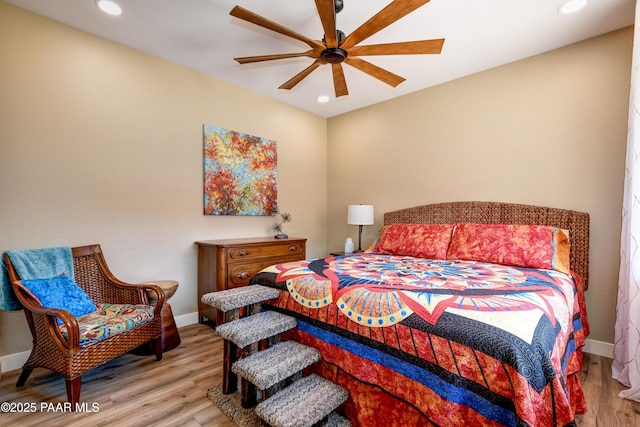 bedroom featuring wood finished floors, recessed lighting, baseboards, and a ceiling fan