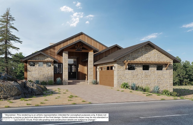 1940 W Rock Castle Dr, Prescott, AZ 86305 - contemporary house with stone siding, an attached garage, and decorative driveway