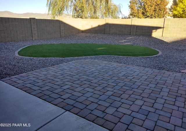 view of patio featuring a fenced backyard